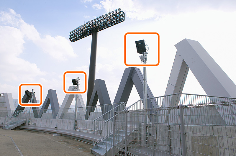 Outdoor compact array speakers distributed to face the south stands deliver uniform sound to spectator seats.