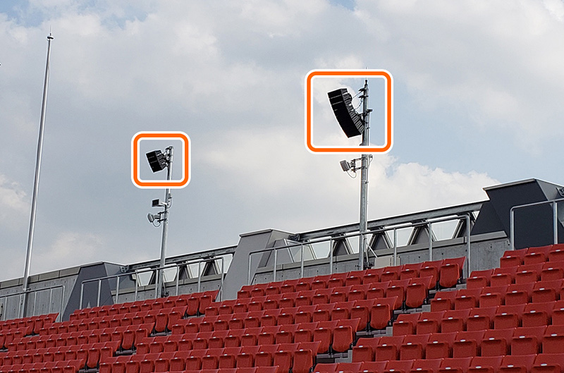 Compact array speakers facing the south spectator stands.